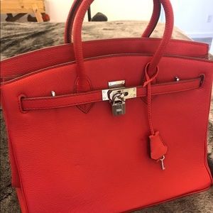 Red Handbag. Clasp Top With Lock and Key